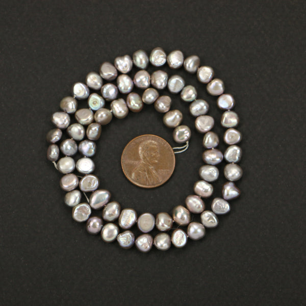 Pearls, Silver, Baroque Shape 6x8mm with One Flat Side on 16-inch Strands