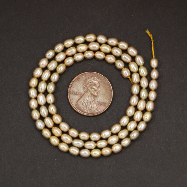Pearls, Champagne Ovals 5x4mm on 16-inch Strands