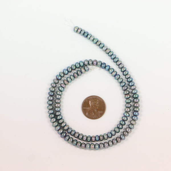 Pearls, Green Iris Buttons 4x5mm on 16-inch Strand