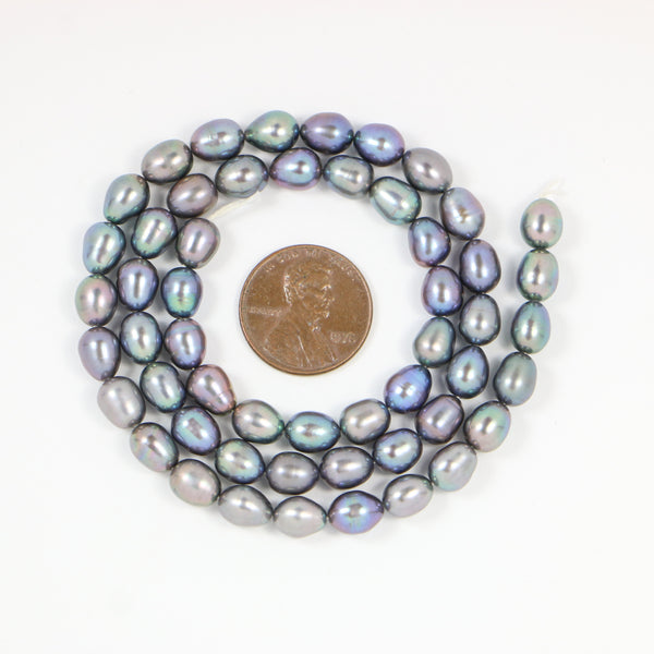 Pearls, Green Iris Ovals 7x6mm on 16-inch Strand