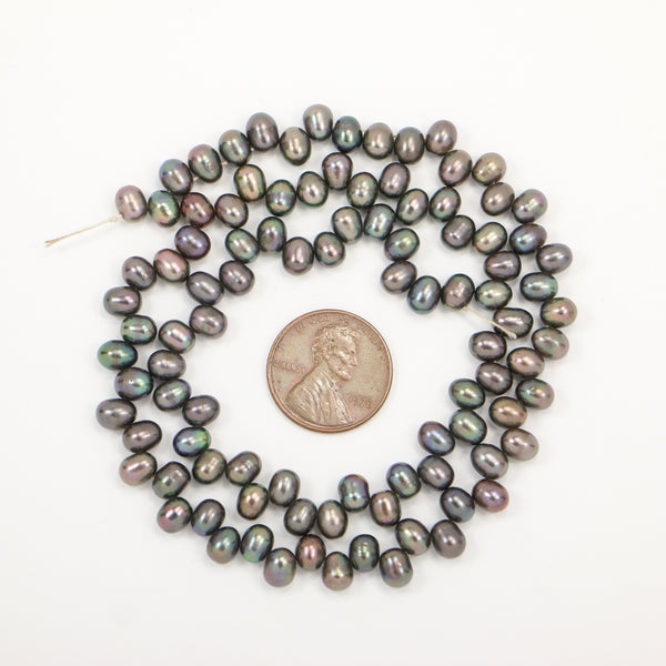 Pearls, Peacock Dancers, Dark Blue-Grey with Purple Highlights, 5x6mm on 16-inch Strand