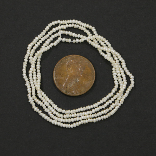 Pearls, White, Button Shape, 1x2mm on 16-inch Strand