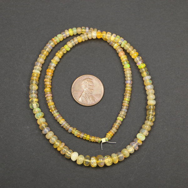 Opals, Ethiopian, Rondelles Graduated 1x2mm to 3x5mm, on 16-inch Strand