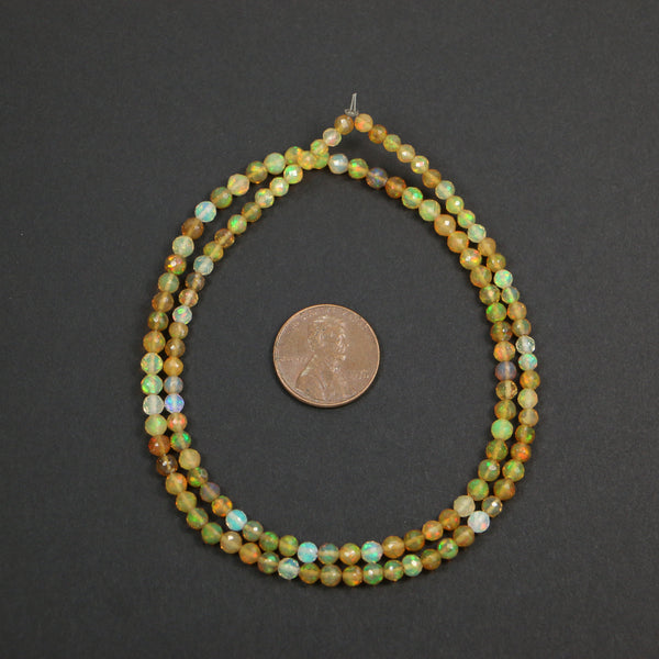 Opals, Ethiopian, Round High Fire Slightly Graduated 2-4mm on 16-inch Strand