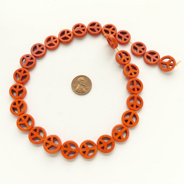 Magnesite Dyed Orange, Peace Sign 15mm Diameter, on 16-inch Strands