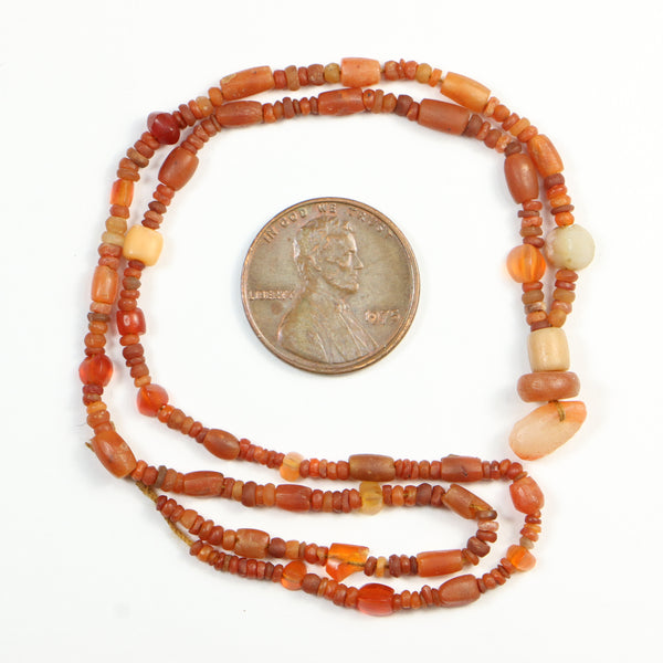 Ancient, Bactrian Carnelian Beads from Afghanistan, 15-inch Strand with Small Pendant