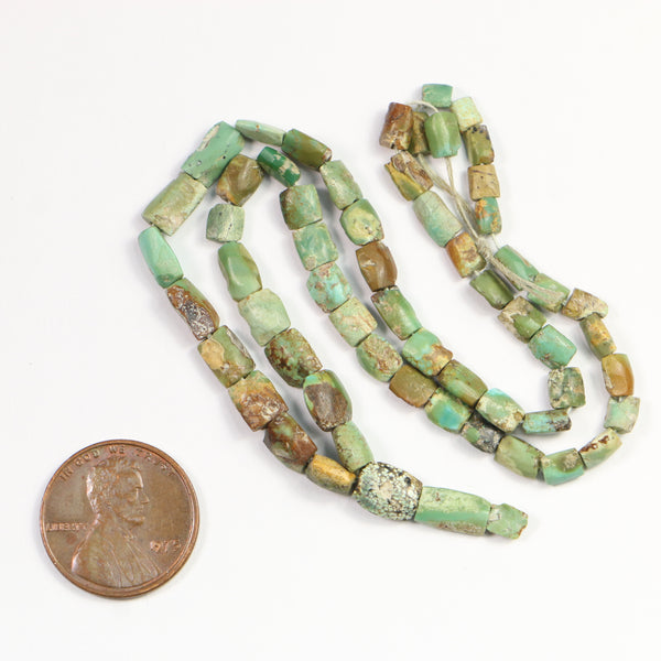 Ancient Turquoise, Lozenge Shapes 5-7mm x4mm on 15-inch strand with Small Pendant