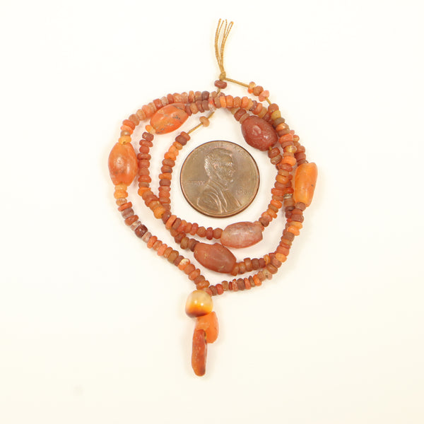 Ancient, Bactrian Bronze Age Carnelian from Afghanistan, 15-inch Strand with Small Pendant