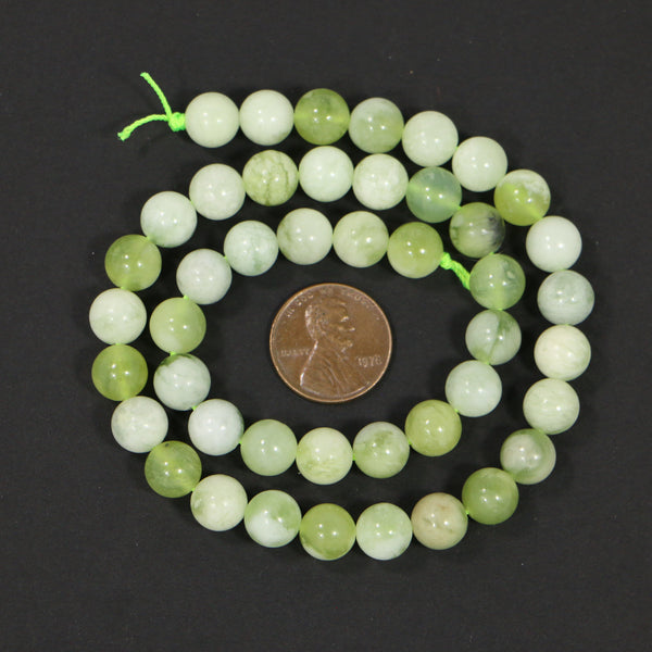 Serpentine, Round 8mm Diameter, Pale Green to Near White, on 16-inch Strands