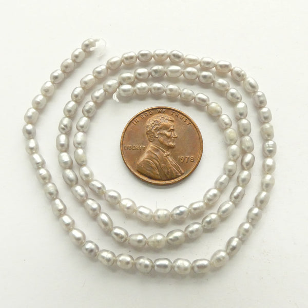 Pearls, Silver, Rice Shape, Small 3x2mm on 16-inch Strands