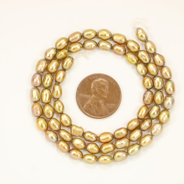 Pearls, Champagne (More Beige Than Most) Oval 8x5mm on 16-inch Strand