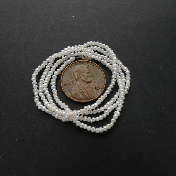 Pearls, White, Oblate , Tiny 1x2mm on 16-inch Strands