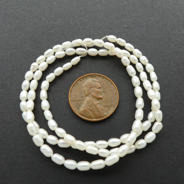 Pearls, White, Baroque Small Rice Shape 6x4mm on 16-inch Strands
