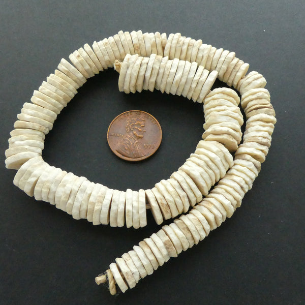 Ostrich Eggshell Heishi, Graduated Sizes 9-14mm on 12-inch Strand