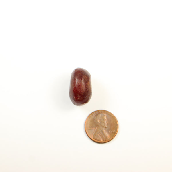 African Amber, Small Reddish Hand-carved 13x20mm