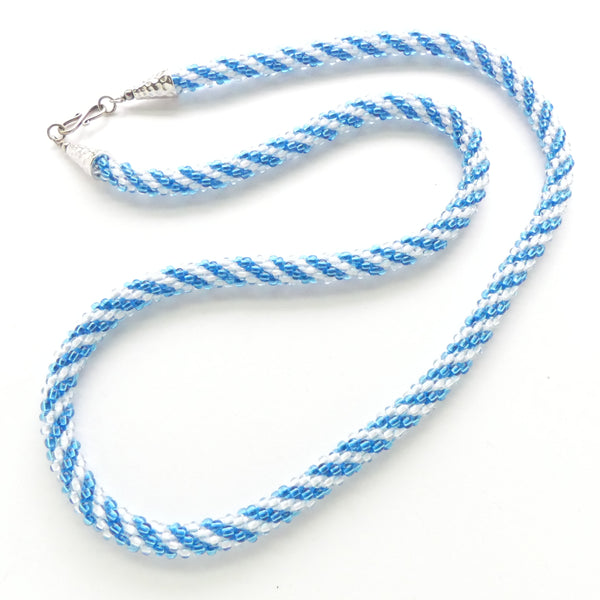 Kumihimo with Spiraling Crystal and Aqua Seed Beads, 26 inches long