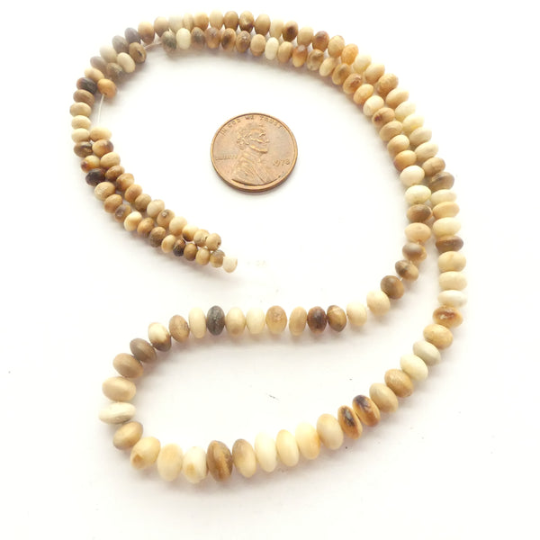 Bone, Mammoth Tusk Vintage Rondells, 2x3 to 4x7mm on 20-inch Graduated Strand