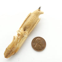 Bone, Eagle on a Branch, Carved in Walrus Tusk, 3.25 inches Long with Silver Bail