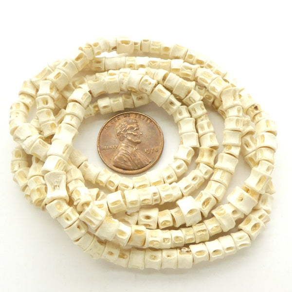 Bone, Fish Vertebrae, Small 3x5mm on 30-inch Strand