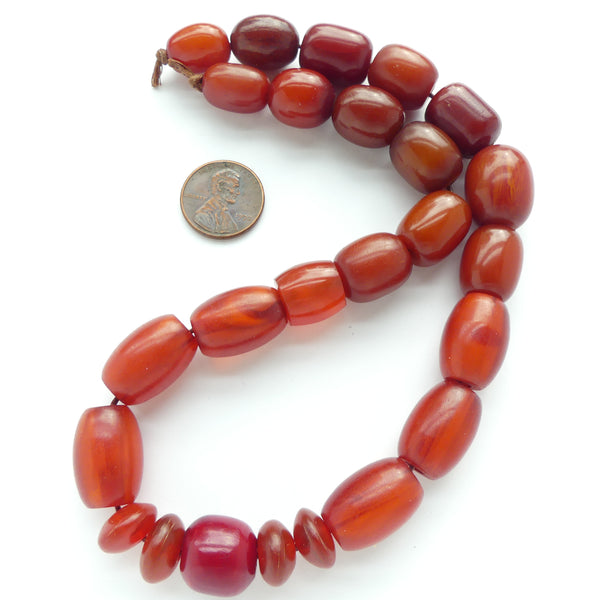 Resin, Red Faturan, Lovely Mix of Ovals, Barrels & Rondelles, Largest 20x13, on 15-inch Strand
