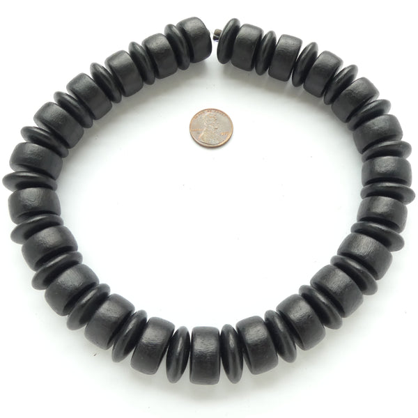 Wood Barrels and Rondelles, Black 20mm Diameter on 16-inch Strands