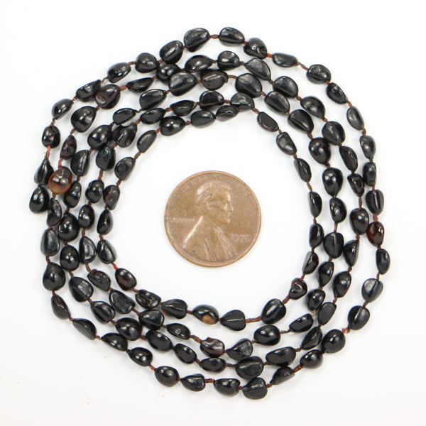 Seed, Shiny Black Irregular Shapes About 5x3mm on Knotted 29-inch Strand