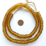 Powder Glass (Fused) New Donuts, Dark Honey Color, 4x12mm on 22-inch Strands