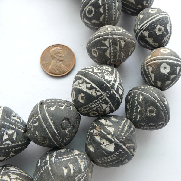 Spindle Whorl Clay Beads, Strand of 27 in Assorted Patterns