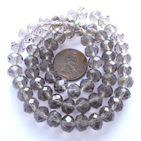 Faceted Glass "Dragon Crystal" 6x8mm Grey Translucent on 16-inch Strands