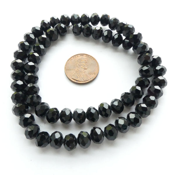 Faceted Glass "Dragon Crystal" 6x8mm, Black Opaque, 16" Strands