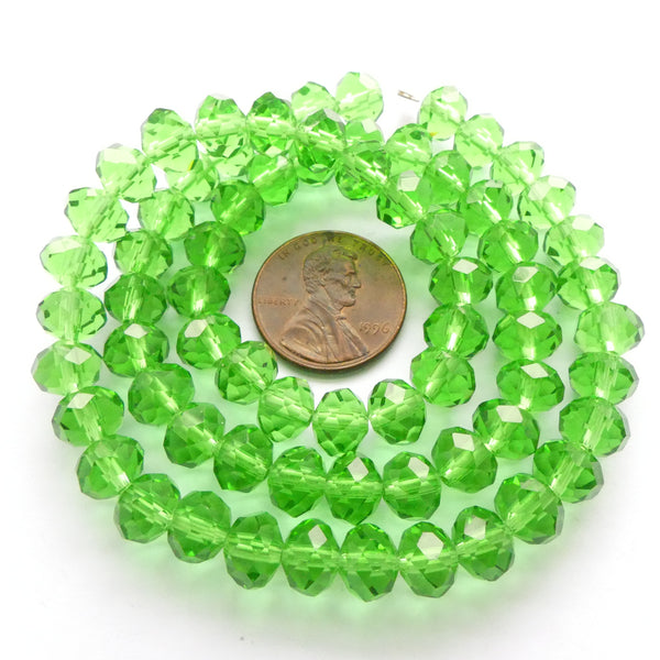 Faceted Glass "Dragon Crystal" 6x8mm, Green, Light Translucent, 16" Strands