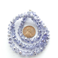 Faceted Glass "Dragon Crystal" 4x6mm, Blue-Violet, Pale with Iris Finish 16" Strand