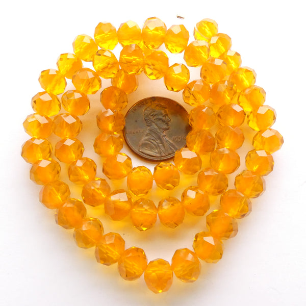 Faceted Glass "Dragon Crystal" 6x8mm, Orange-Lined Orange Translucent, 16" Strands