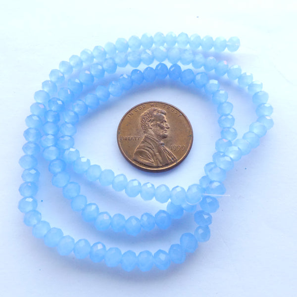 Faceted Glass "Dragon Crystal" 3x4mm, Light Cornflower Blue Opal, 16-inch Strands