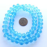 Faceted Glass "Dragon Crystal" 8x10mm Aqua on 16-inch Strand