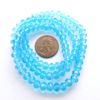 Faceted Glass "Dragon Crystal" 6x8mm Aqua on 16-inch Strands