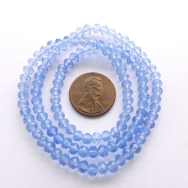 Faceted Glass "Dragon Crystal" 3x5mm Light Transparent Blue on 16-inch Strands