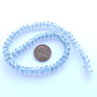Faceted Glass "Dragon Crystal" 4x6mm, Translucent Light Blue AB, 12-inch Strands