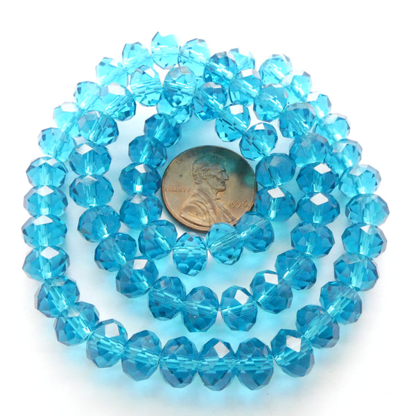 Faceted Glass "Dragon Crystal" 6x8mm, Translucent Dark Aqua, 16-inch Strands