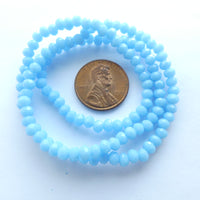 Faceted Glass "Dragon Cyrstal" 2x3mm, Light Blue Opaque, 16-inch Strands