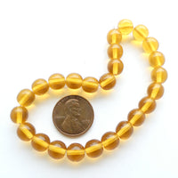 Czech Glass Smooth Round "Druks" 8mm, Dark Amber, Strands of 25