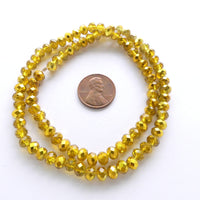 Faceted Glass "Dragon Crystal" 4x6mm, Yellow with Gold, 16" Strands