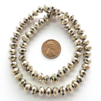 Faceted Glass "Dragon Crystal" 6x8mm, Light Bronze, 16" Strands