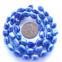 Pearls, Dyed Blue, Irregular Ovals, 10x5mm on 16" Strands