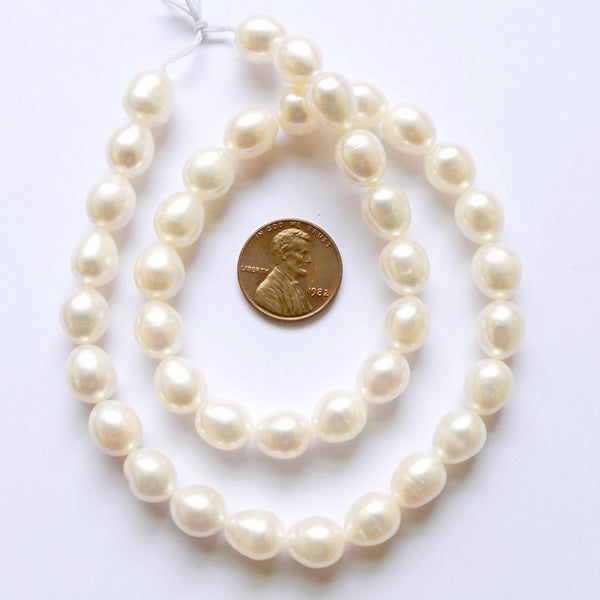 Pearls, White, Oval 10x8mm on 16-inch Strand