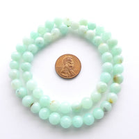 Chrysoprase, 7mm Round, Light Translucent Green on 16-inch Strands