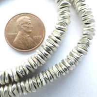 Silver Plated Freeform Disc Strands, 7mm