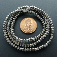 Cast White Metal Mini Bicones, 3x4mm on 15" Strands