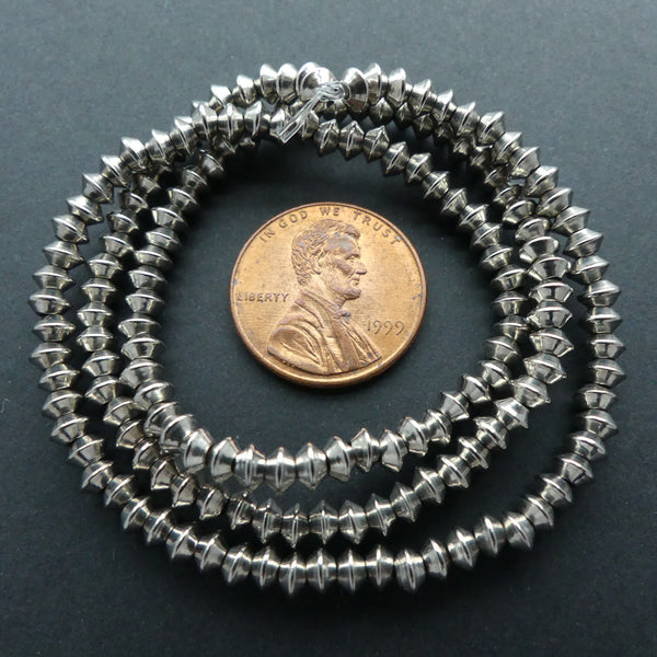 Cast White Metal Mini Bicones, 3x4mm on 15" Strands