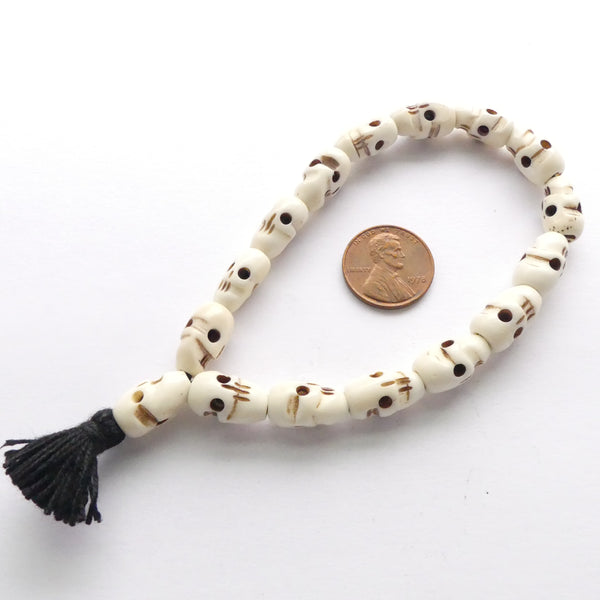 Skull Bone Bracelet Mala on Elastic Cord, 16 Carved Beads